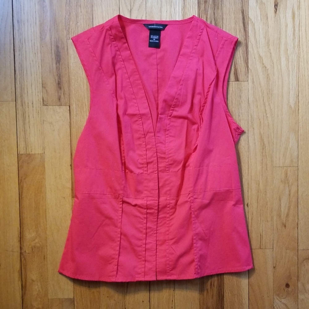 Pink sleeveless blouse